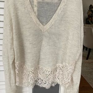 Cashmere sweater with lace trim